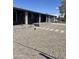 Landscaped front yard with gravel and modern block planters at 8520 E Mackenzie Dr, Scottsdale, AZ 85251