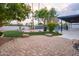 Expansive backyard with a pool and a large grassy area at 8709 E Irish Hunter Trl, Scottsdale, AZ 85258