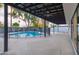 Covered patio overlooking the sparkling pool at 8709 E Irish Hunter Trl, Scottsdale, AZ 85258