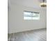 Bright bedroom with hardwood floors and a large window at 8709 E Irish Hunter Trl, Scottsdale, AZ 85258