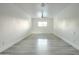 Spacious bedroom with light gray wood flooring and ceiling fan at 8709 E Irish Hunter Trl, Scottsdale, AZ 85258