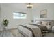 Charming bedroom with geometric wallpaper, natural light, and comfortable bed at 8709 E Irish Hunter Trl, Scottsdale, AZ 85258
