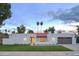 Stunning mid-century modern home with a beautifully landscaped front yard at 8709 E Irish Hunter Trl, Scottsdale, AZ 85258