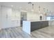 Spacious kitchen with stainless steel appliances and island at 8709 E Irish Hunter Trl, Scottsdale, AZ 85258