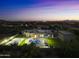 Luxury estate with a large backyard, pool, and sports court at 8802 E Rimrock Dr, Scottsdale, AZ 85255