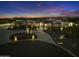 Grand estate with a circular driveway and desert landscaping at 8802 E Rimrock Dr, Scottsdale, AZ 85255