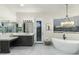 Bathroom with soaking tub, double vanity and walk in shower at 8802 E Rimrock Dr, Scottsdale, AZ 85255