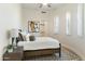Bright bedroom with wood flooring and window shutters at 8802 E Rimrock Dr, Scottsdale, AZ 85255