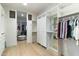 Large walk-in closet with ample shelving and hanging space at 8802 E Rimrock Dr, Scottsdale, AZ 85255