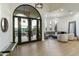 Grand entryway featuring arched windows and a sitting area at 8802 E Rimrock Dr, Scottsdale, AZ 85255