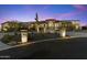 Elegant home with a large front yard and beautiful landscaping at 8802 E Rimrock Dr, Scottsdale, AZ 85255