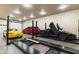 Finished garage with car lifts and ample space at 8802 E Rimrock Dr, Scottsdale, AZ 85255
