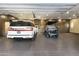 Finished garage with ample room for car and golf cart storage at 8802 E Rimrock Dr, Scottsdale, AZ 85255