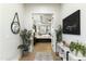 Hallway with mirror and view of a bedroom at 8802 E Rimrock Dr, Scottsdale, AZ 85255