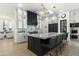Modern kitchen features a large island, stainless steel appliances, and sleek cabinetry at 8802 E Rimrock Dr, Scottsdale, AZ 85255