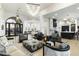 Spacious living area boasts a chic design, comfortable seating, and hardwood floors at 8802 E Rimrock Dr, Scottsdale, AZ 85255