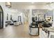Open living area with hardwood floors, comfortable seating, and kitchen views at 8802 E Rimrock Dr, Scottsdale, AZ 85255