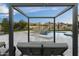 Luxury pool and spa with mountain views, expansive patio, and comfortable lounge seating at 8802 E Rimrock Dr, Scottsdale, AZ 85255