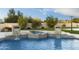Stunning pool with a spa and cascading waterfalls, perfect for relaxation at 8802 E Rimrock Dr, Scottsdale, AZ 85255