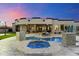Resort-style backyard oasis with a pool and spa at 8802 E Rimrock Dr, Scottsdale, AZ 85255