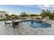 Inviting pool and spa with seating area and multiple lounge chairs for relaxation at 8802 E Rimrock Dr, Scottsdale, AZ 85255