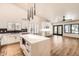 Modern kitchen with island, breakfast area and view to backyard at 9222 S 51St St, Phoenix, AZ 85044