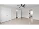 Spacious bedroom with tile flooring and an ensuite bathroom at 947 N 85Th Pl, Scottsdale, AZ 85257