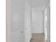 Hallway with ample storage and tile flooring at 947 N 85Th Pl, Scottsdale, AZ 85257