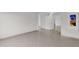 Bright living room with tile flooring and access to other rooms at 947 N 85Th Pl, Scottsdale, AZ 85257