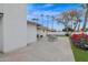 Covered patio with outdoor seating and lush landscaping in a well-maintained backyard at 947 N 85Th Pl, Scottsdale, AZ 85257