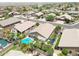 Aerial view of neighborhood highlighting a house with pool at 10405 W Patrick Ln, Peoria, AZ 85383