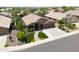 Single story house with landscaped yard, and driveway at 10405 W Patrick Ln, Peoria, AZ 85383