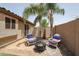 Cozy backyard with fire pit and seating area at 10405 W Patrick Ln, Peoria, AZ 85383