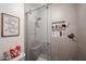 Shower with glass enclosure and storage niche at 10405 W Patrick Ln, Peoria, AZ 85383
