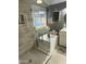 Elegant bathroom featuring a soaking tub, walk-in shower, and modern tile at 10405 W Patrick Ln, Peoria, AZ 85383