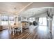 Open living and dining area with wood floors at 10405 W Patrick Ln, Peoria, AZ 85383