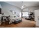 Spacious main bedroom with private door and treadmill at 10405 W Patrick Ln, Peoria, AZ 85383