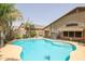 Refreshing kidney-shaped pool, perfect for summer fun at 10405 W Patrick Ln, Peoria, AZ 85383