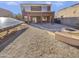 Backyard with gravel, fire pit, and solar panels at 11436 W Austin Thomas Dr, Surprise, AZ 85378