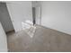 Well-lit bedroom with carpeted floor and closet at 11436 W Austin Thomas Dr, Surprise, AZ 85378