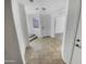 Bright entryway with tiled floor and staircase at 11436 W Austin Thomas Dr, Surprise, AZ 85378