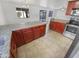 Kitchen boasts granite counters and stainless steel appliances at 11436 W Austin Thomas Dr, Surprise, AZ 85378