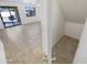 Living room with tile floors and access to backyard at 11436 W Austin Thomas Dr, Surprise, AZ 85378