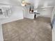 Spacious living room with tile flooring and open floor plan at 11436 W Austin Thomas Dr, Surprise, AZ 85378