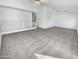 Spacious loft area with carpeted flooring at 11436 W Austin Thomas Dr, Surprise, AZ 85378