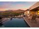 Inviting backyard oasis featuring a sparkling pool, spa, and mountain views at 12544 N 120Th Pl, Scottsdale, AZ 85259