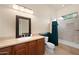 Simple bathroom with single sink, shower/tub combo, and toilet at 12544 N 120Th Pl, Scottsdale, AZ 85259