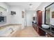 Elegant bathroom with double sinks, soaking tub, and separate shower at 12544 N 120Th Pl, Scottsdale, AZ 85259