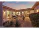 Peaceful courtyard with seating area, fountain, and access to interior at 12544 N 120Th Pl, Scottsdale, AZ 85259