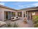 Peaceful courtyard with fountain and patio furniture at 12544 N 120Th Pl, Scottsdale, AZ 85259